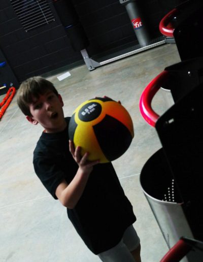 Young male active with Exergame's Fit Interactive Heavy Ball system