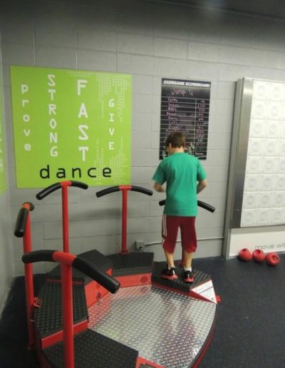 Young male uses Jump Q interactive fitness gaming platform